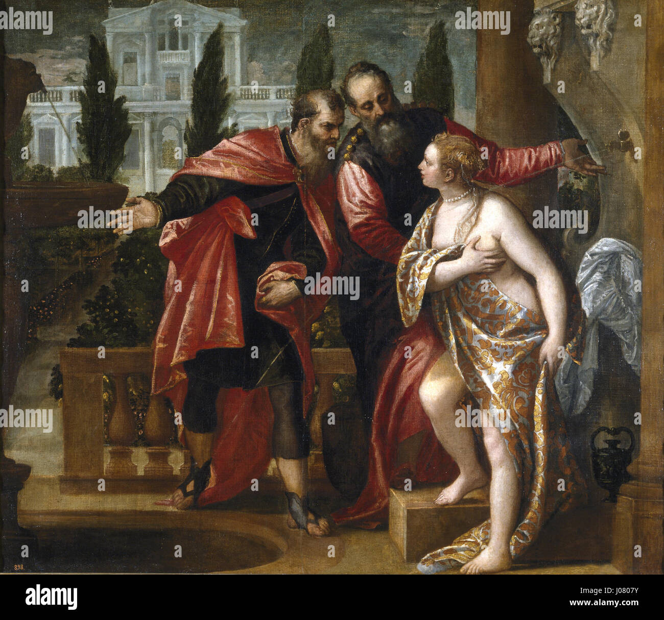 Susana e gli anziani di Paolo Veronese descrive la storia biblica di Susana, una donna falsamente accusata di infedeltà da due anziani. Il lavoro di Veronese cattura il momento della sua angoscia e lo sguardo ingannevole degli anziani. Il dipinto esemplifica lo stile rinascimentale veneziano con i suoi colori vivaci e la sua composizione drammatica. Foto Stock