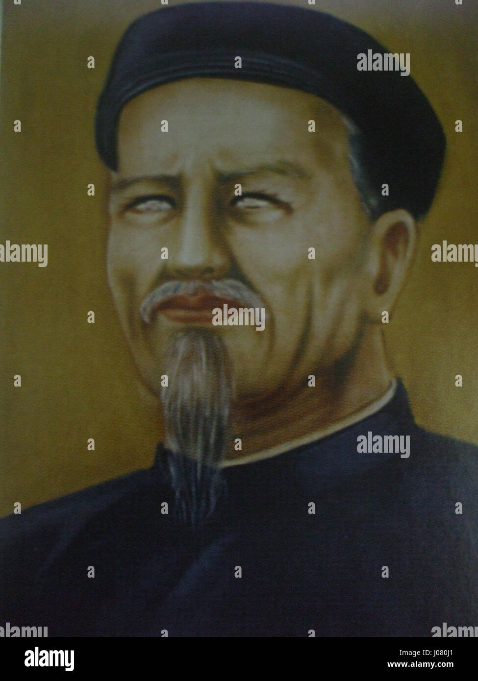 "Chân dung Nguyễn Dình Chiểu" è un ritratto di Nguyễn Dình Chiểu, un rinomato studioso e poeta vietnamita del XIX secolo. Le sue opere sono significative nel contesto della letteratura vietnamita e della resistenza contro l'influenza straniera. Foto Stock