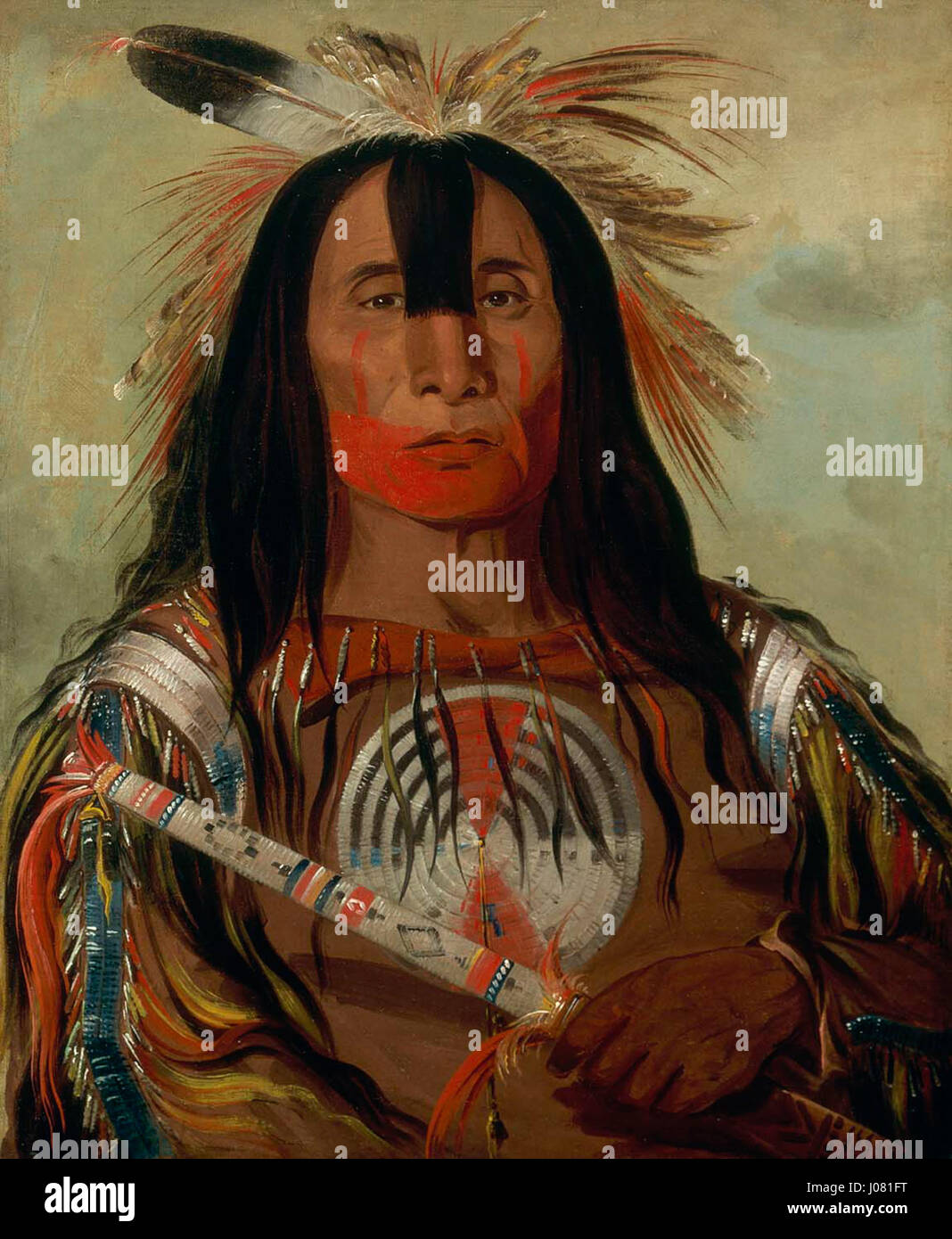 "Stu-mick-o-S£cks", noto anche come Buffalo Bull's Back Fat, era un capo di spicco della tribù del sangue, parte della Confederazione dei piedi Neri. Questo ritratto cattura la sua leadership e il suo significato all'interno della tribù, riflettendo il ricco patrimonio e la storia dei nativi americani in Nord America. Foto Stock