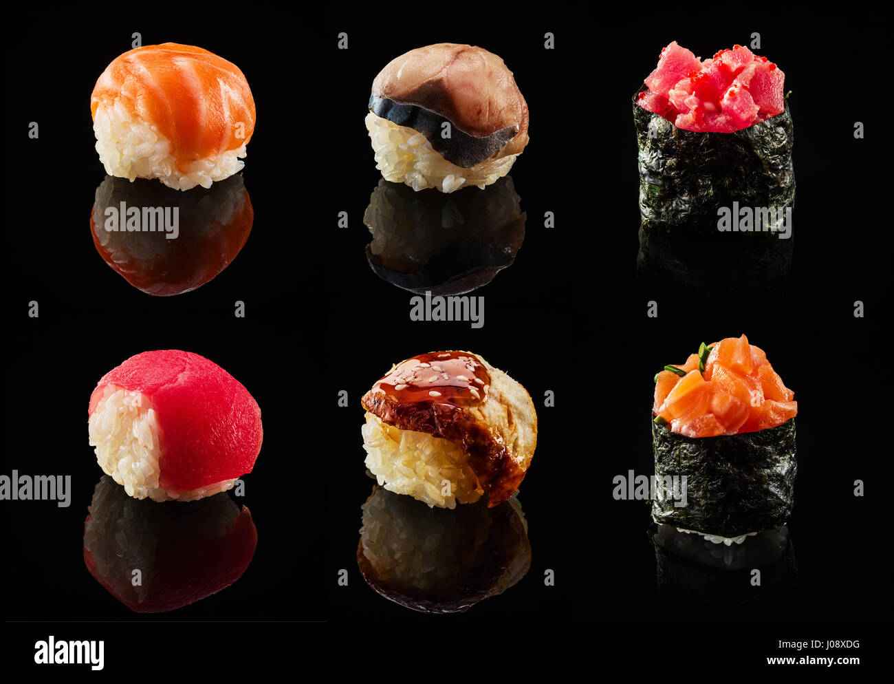 Serie di sfere di sushi e rotoli maki su sfondo nero Foto Stock