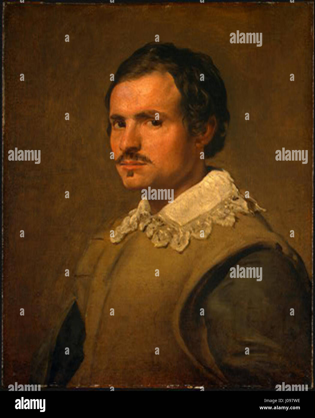 Questo ritratto del XVII secolo, attribuito alla cerchia di Diego Velázquez, raffigura un giovane vestito d'epoca. L'artista cattura la sua espressione e la sua postura dignitosa, caratteristica dei ritratti di corte di Velázquez, che riflettono l'influenza dello stile barocco spagnolo. Foto Stock