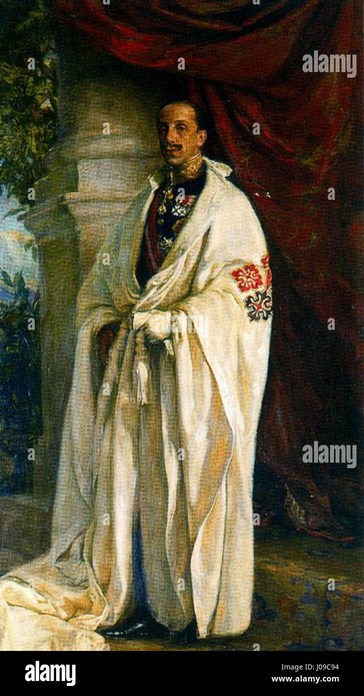 Questo ritratto di Alfonso XIII raffigura il re spagnolo che indossa l'abitudine di Gran Maestro degli ordini militari. L'immagine rappresenta il suo alto rango militare e l'importanza simbolica degli ordini nella storia spagnola. Foto Stock