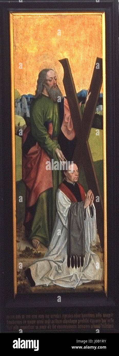 Questo trittico, caratterizzato da una discesa de Croix (discesa dalla Croce), mostra Sant'Andrea sul pannello sinistro. Il pezzo fa parte di un'opera religiosa più ampia, che illustra la crocifissione di Cristo e gli eventi che lo circondano, mettendo in mostra la dettagliata arte religiosa rinascimentale. Foto Stock Questo trittico, caratterizzato da una discesa de Croix (discesa dalla Croce), mostra Sant'Andrea sul pannello sinistro. Il pezzo fa parte di un'opera religiosa più ampia, che illustra la crocifissione di Cristo e gli eventi che lo circondano, mettendo in mostra la dettagliata arte religiosa rinascimentale. Foto Stock