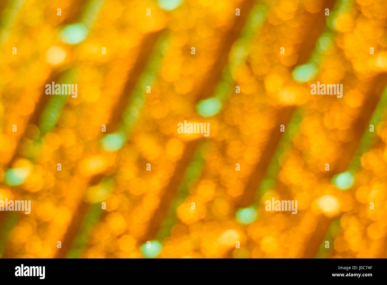 Abstract giallo-oro di sfondo con possibile uso con organici e concetti medici. Foto Stock