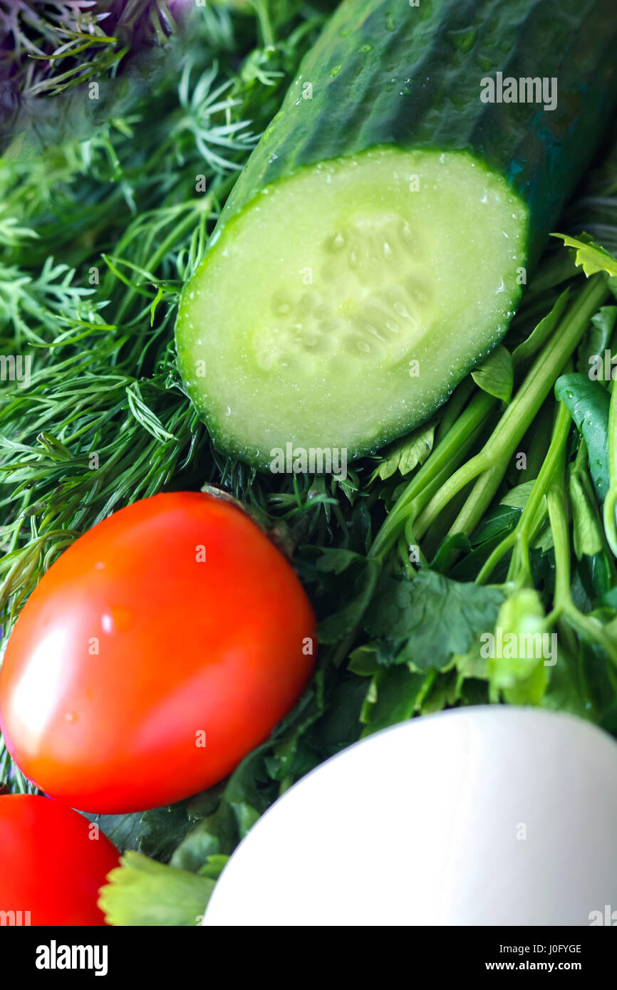 I cetrioli e pomodori verdi con uovo Foto Stock
