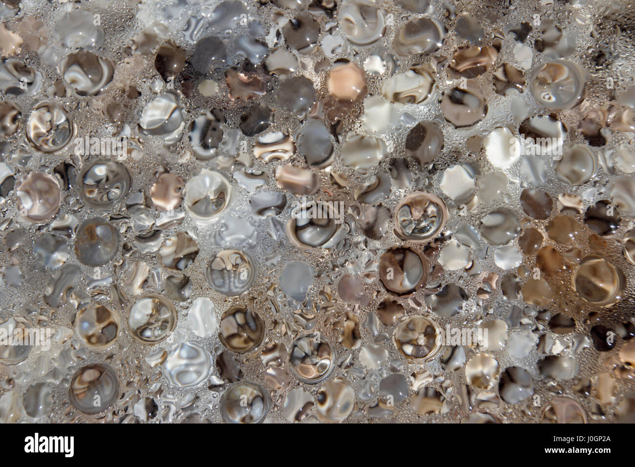 Abstract glitter naturale acqua colorata sfondo, wallpaper Foto Stock