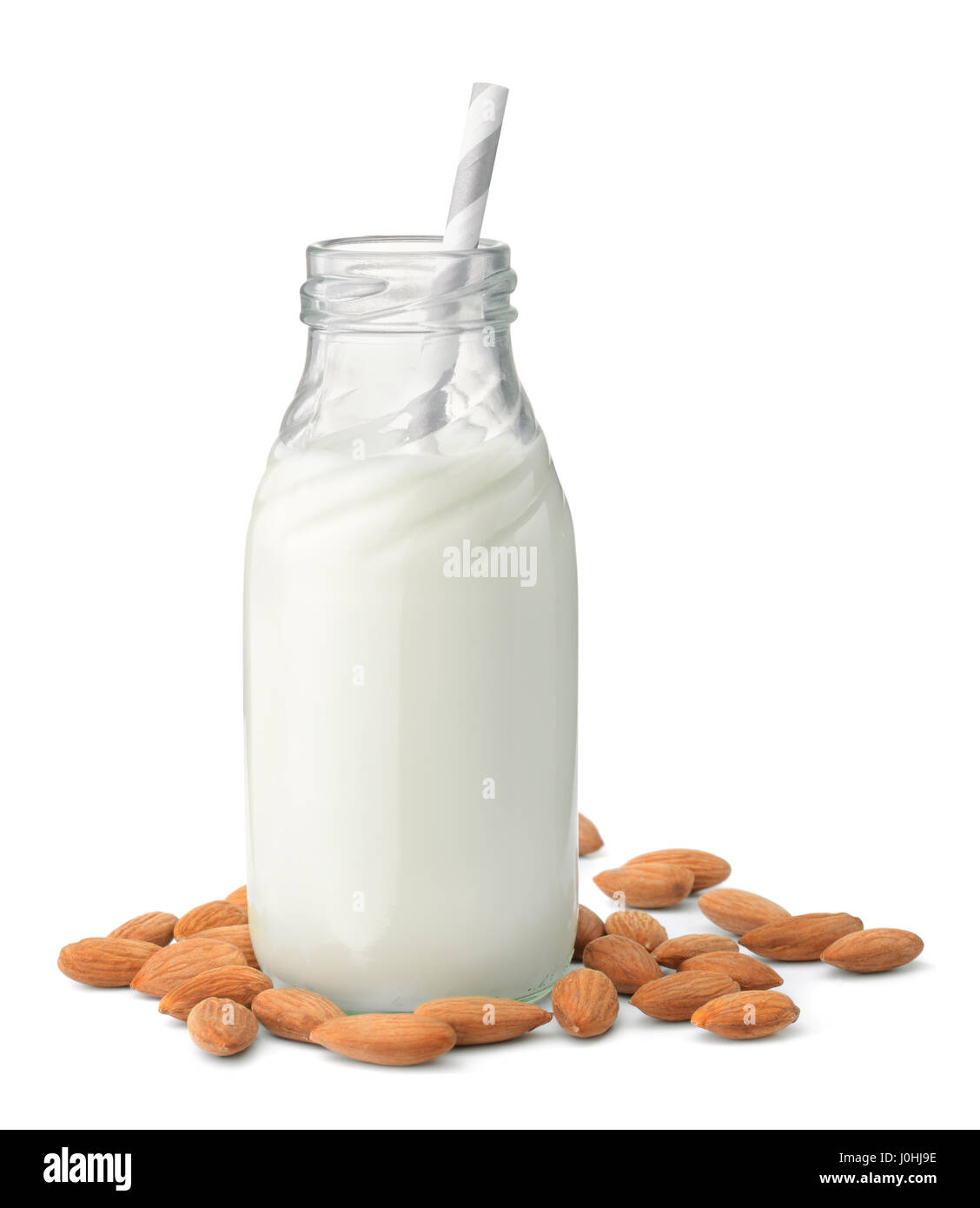 Bottiglia di vetro del latte di mandorla isolato su bianco Foto Stock
