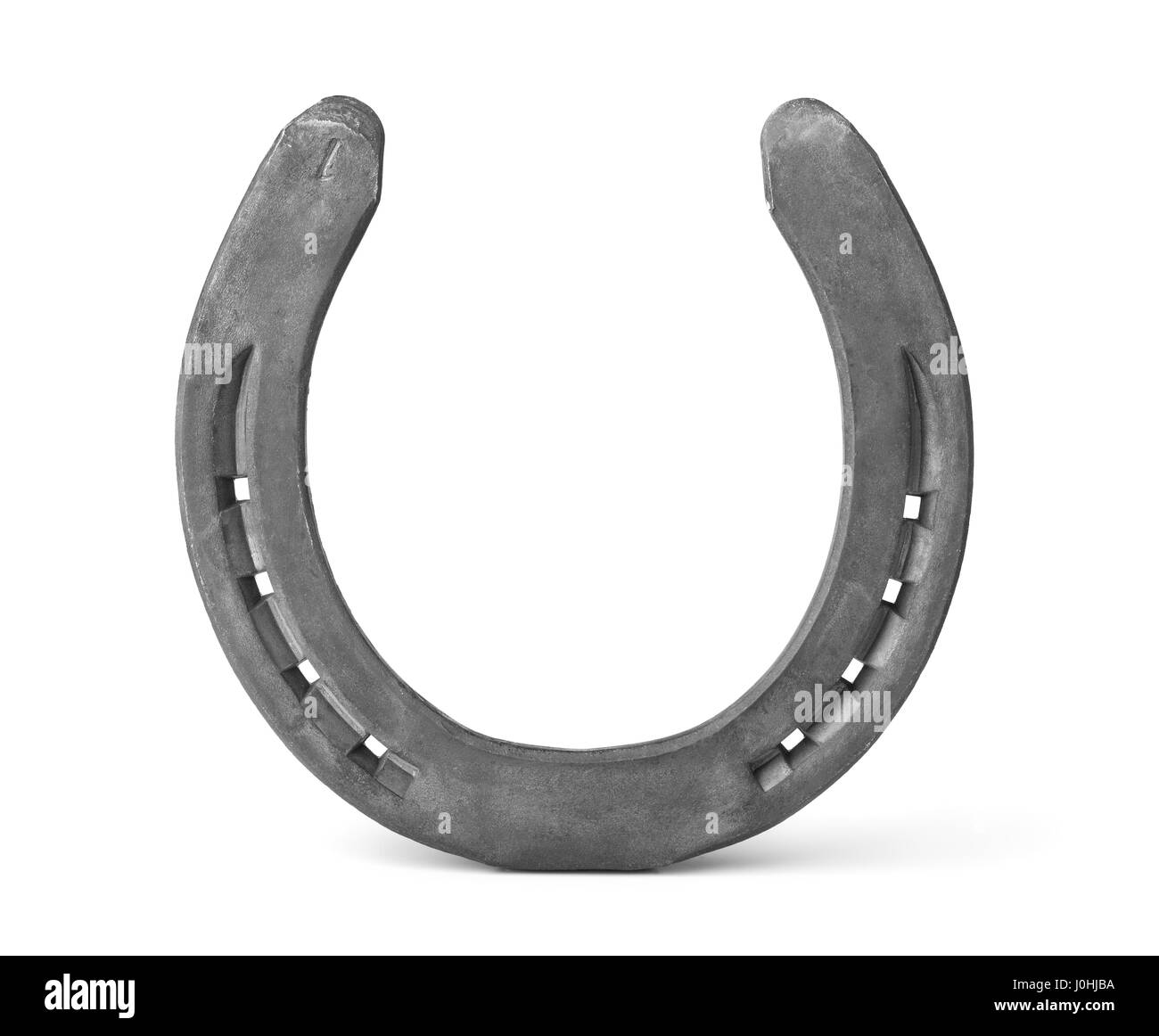 Ferro di cavallo di ferro isolato su bianco Foto Stock