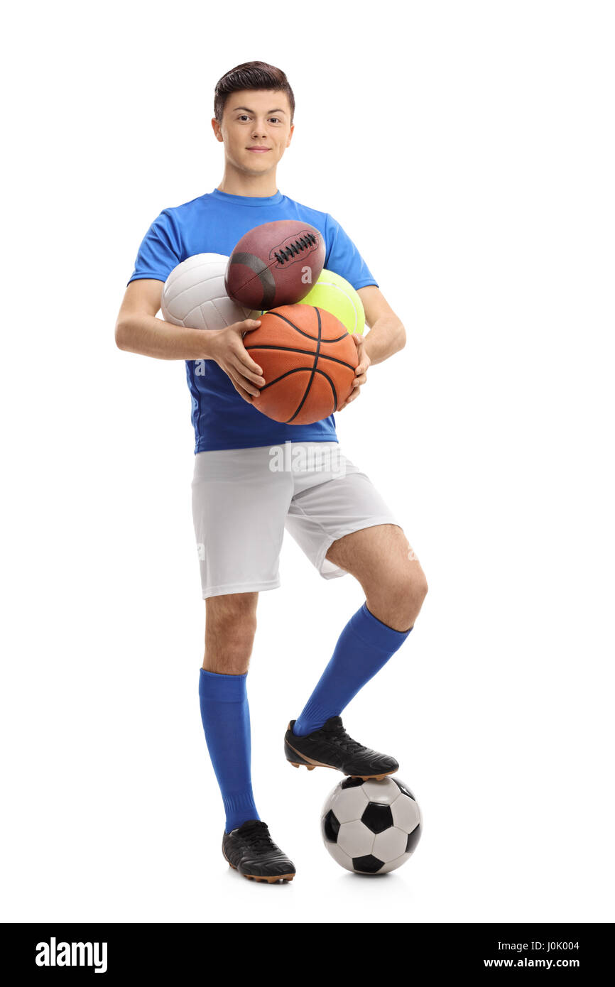 A piena lunghezza Ritratto di un atleta di adolescenti con differenti tipi di palle sportive isolati su sfondo bianco Foto Stock