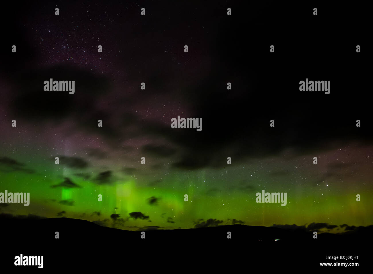 Aurora Boreale visto dalla A82 attraverso Rannoch Moor, Highlands Scozzesi. Foto Stock