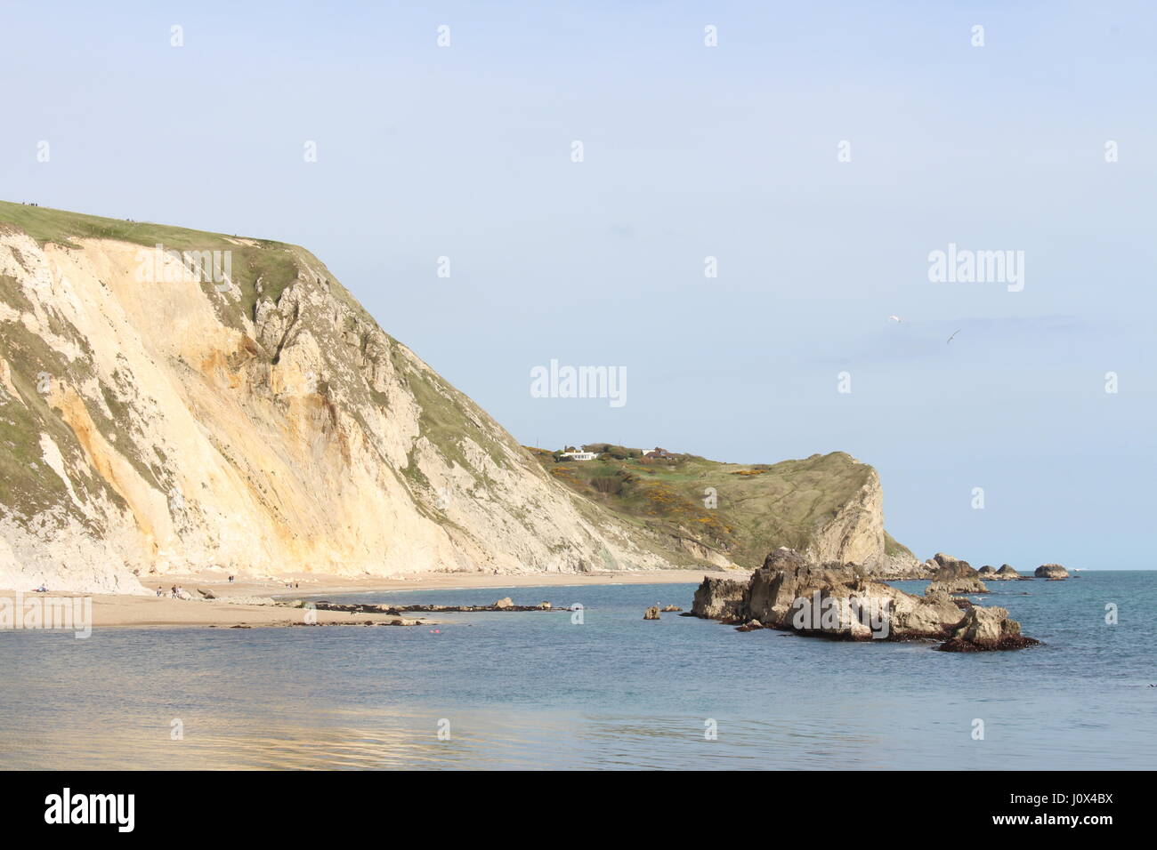 Porta di Durdle beach e la fascia costiera lungo la Jurassic Coast, Dorset. Foto Stock