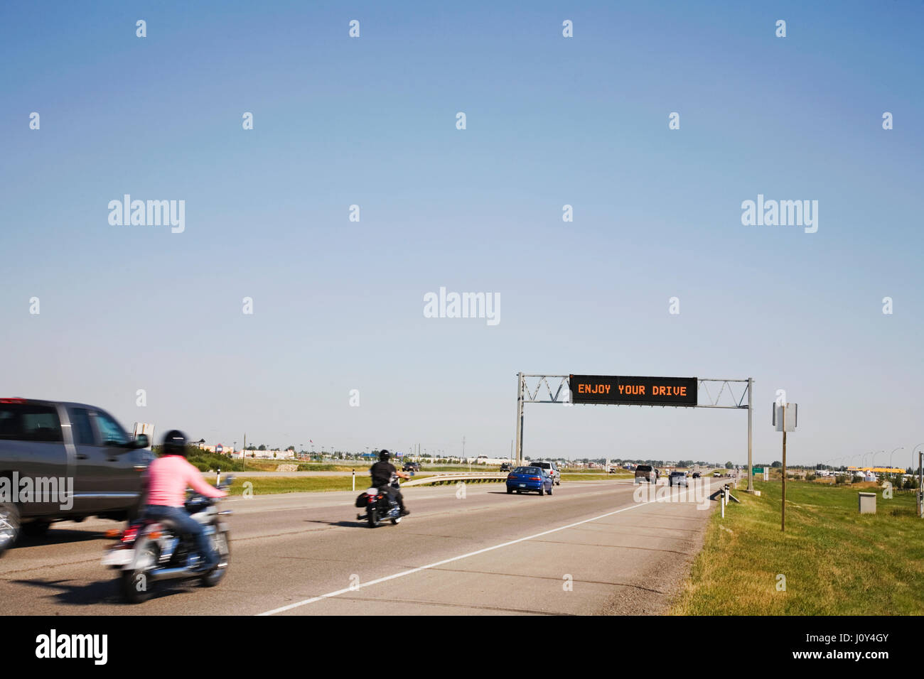 Viaggiare sulla autostrada #2 con godetevi il vostro segno di unità di Calgary, AB. Canada Foto Stock