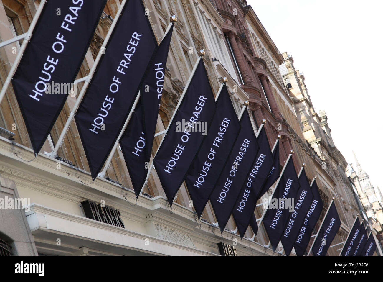 House of Fraser bandiere al di fuori del negozio su Buchanan Street Glasgow Foto Stock