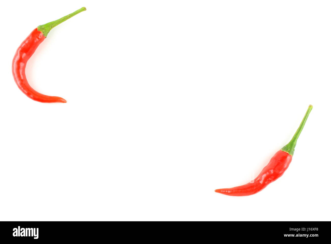 Fresh Thai Chilli peppers isolato su uno sfondo bianco come un cibo texture di sfondo Foto Stock