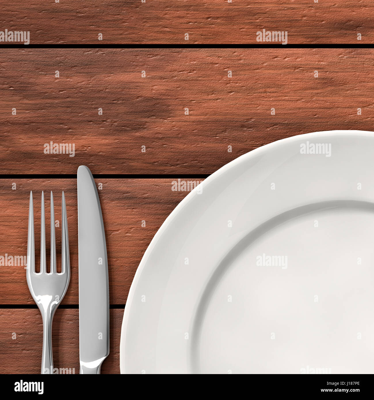 Coltello, forchetta e piatto bianco sul tavolo da pranzo Foto Stock