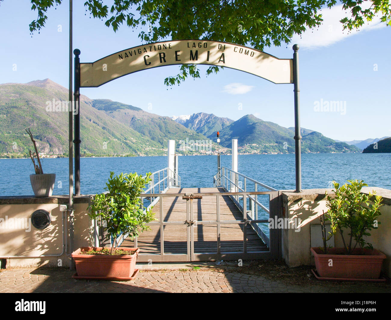 Cremia, Italy - april 18, 2016: Pier boarding and landing stage for the navigation of the lake Foto Stock