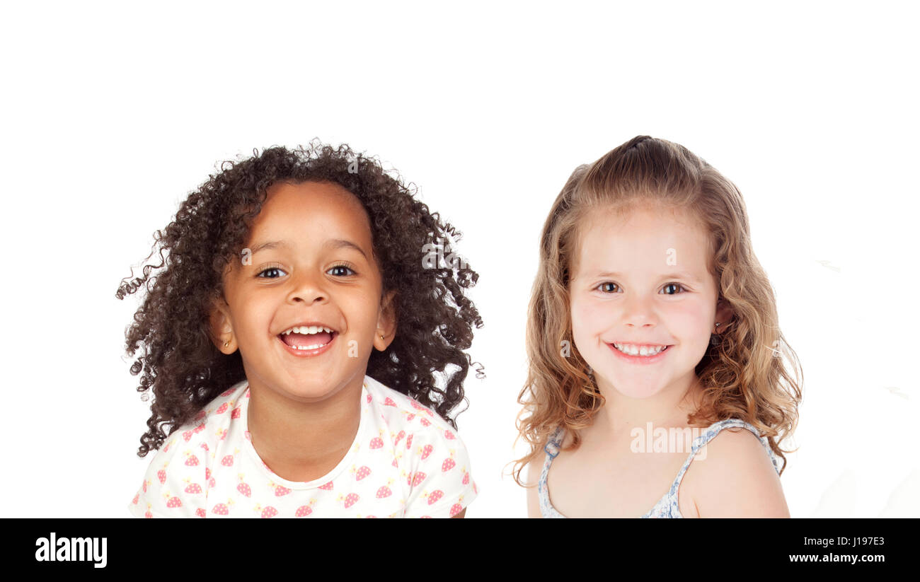 Dei bambini felici guardando la telecamera isolata su uno sfondo bianco Foto Stock