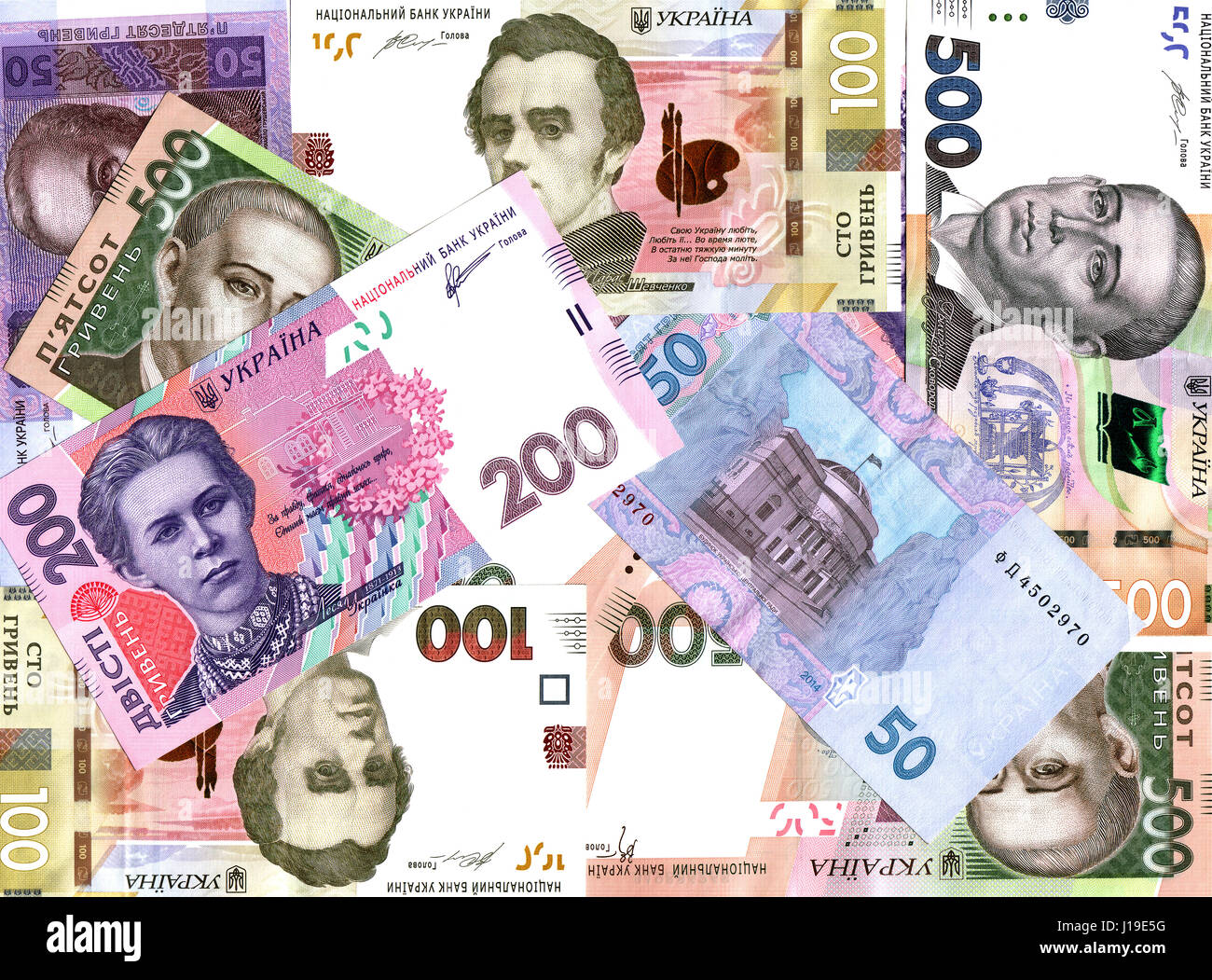 La sfondo caotico di banconote di carta alta stima stato ucraino Foto Stock