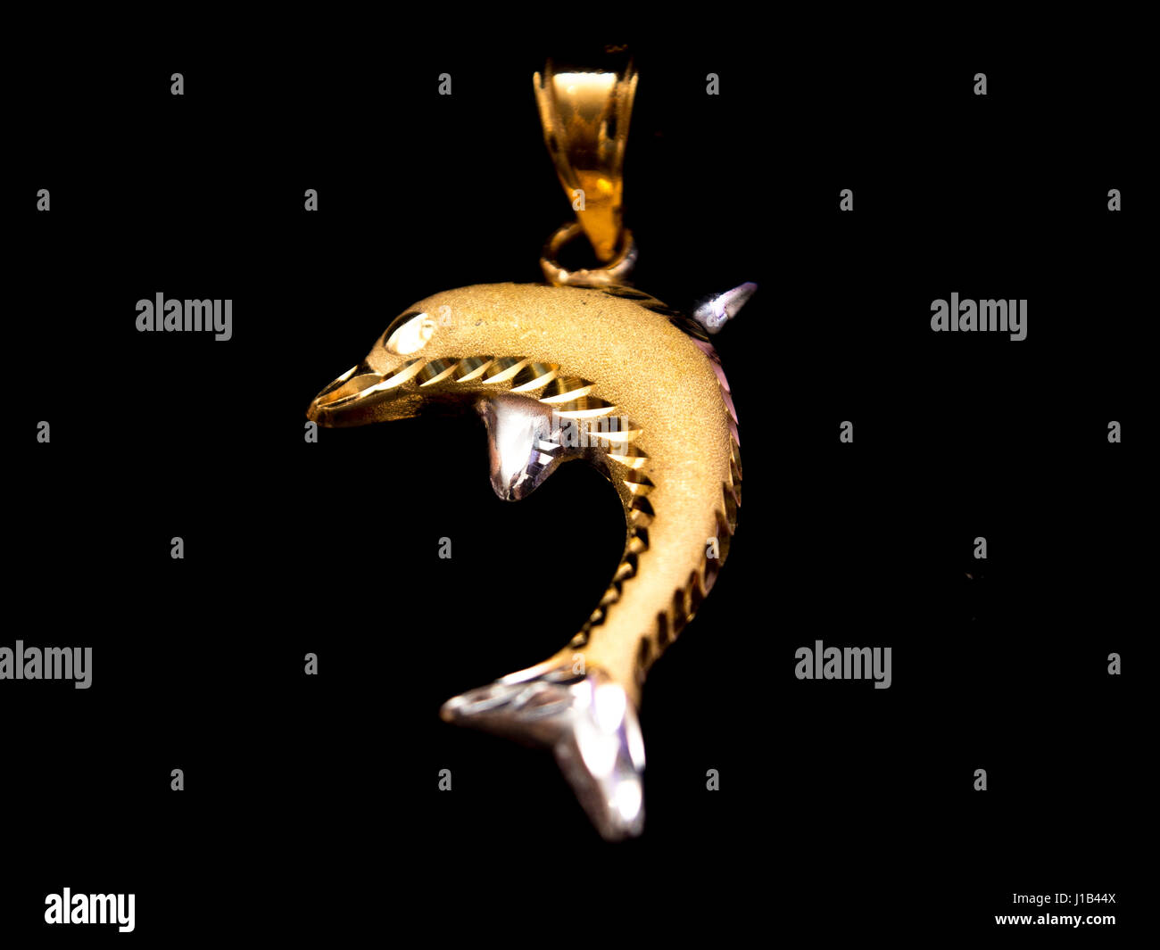 Dolphin pendente in oro Foto Stock
