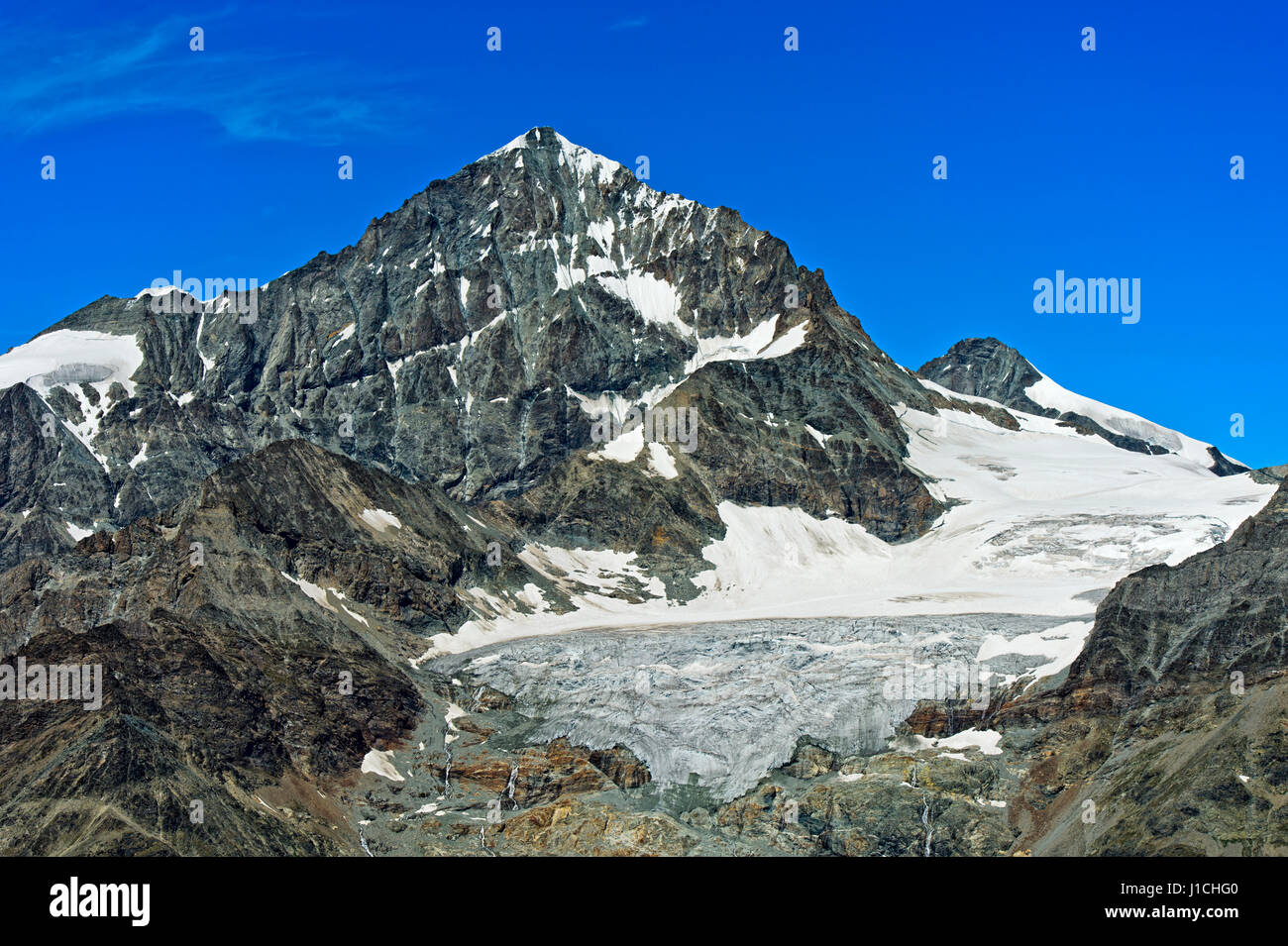 Il picco Dent Blanche e la ritirata Schönbiel ghiacciaio Zermatt, Vallese, Svizzera Foto Stock
