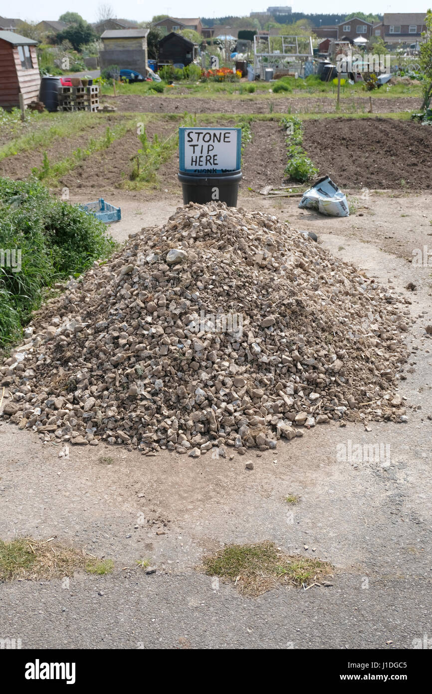 Punta di pietra a UK riparto. Previsto per i titolari di assegnazione per eseguire il dump di pietre da loro tenute Foto Stock