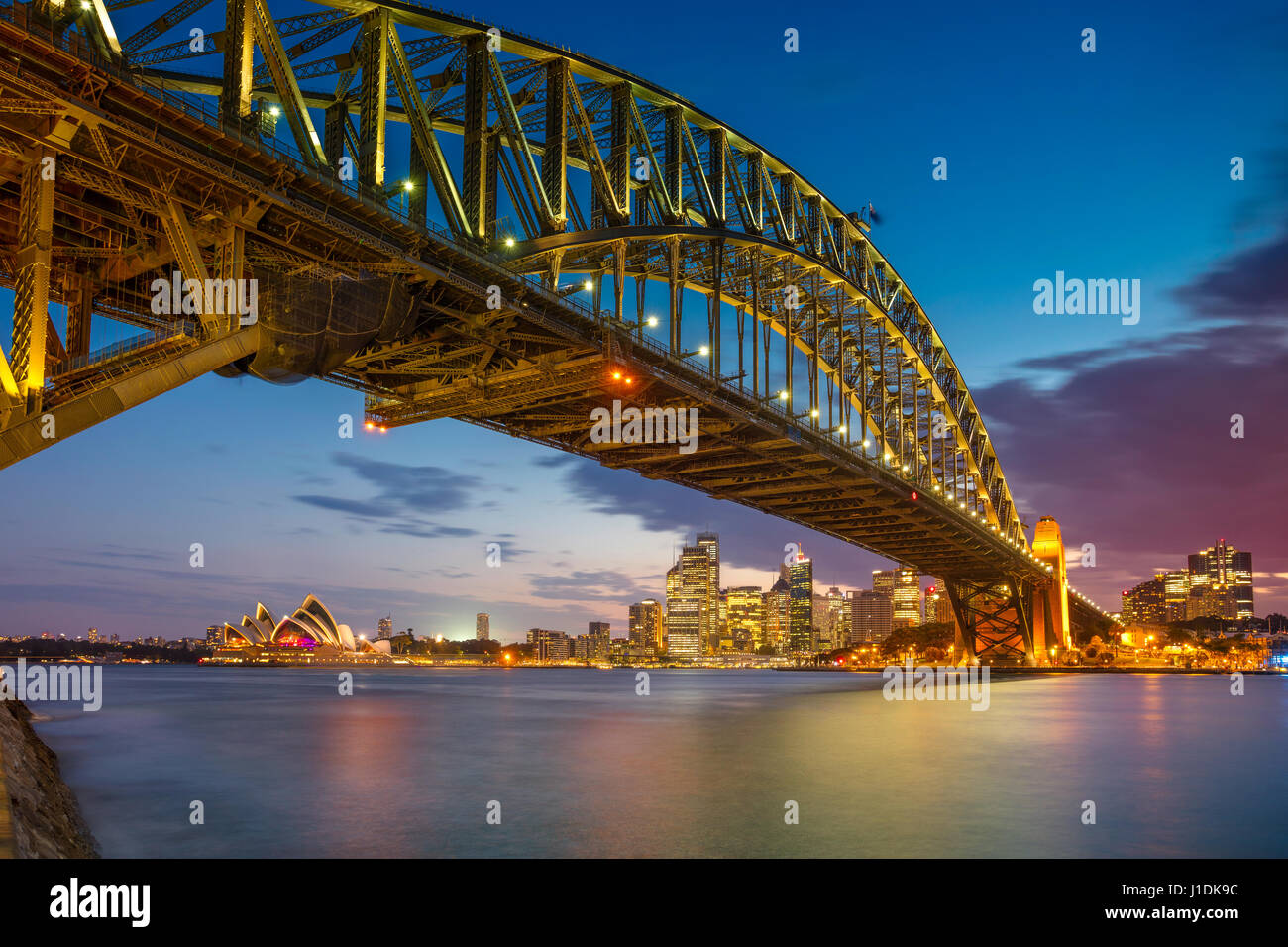 Sydney. Cityscape immagine di Sydney, Australia con Harbour Bridge al tramonto. Foto Stock