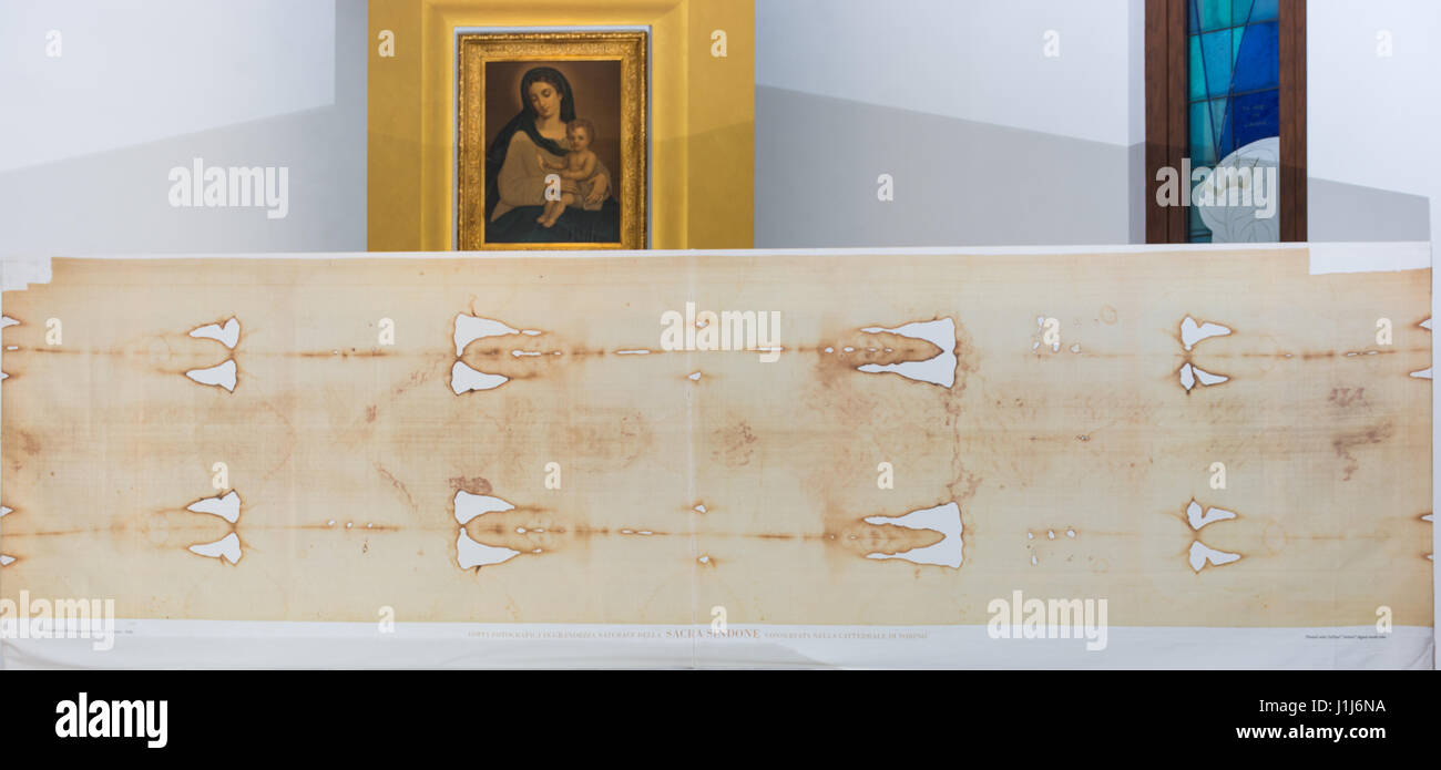Astratto e concettuale di cattolicesimo, la Sacra Sindone di Torino. Conosciuta come la Sacra Sindone, o la Sindone è un telo di lino conservato nel Duomo di Torino. Il Foto Stock