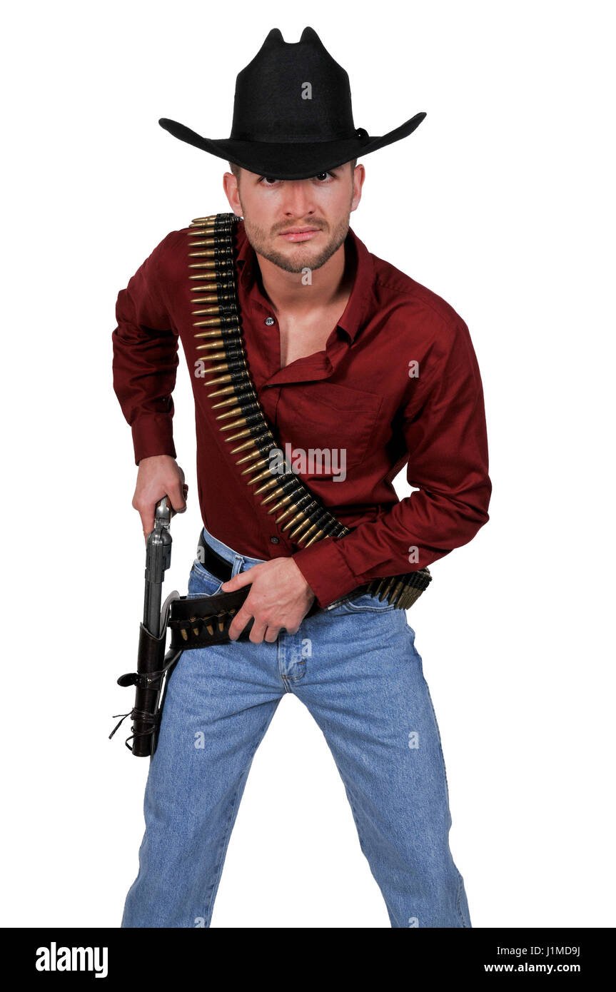Bello cowboy uomo con sei pistole sparatutto Foto Stock