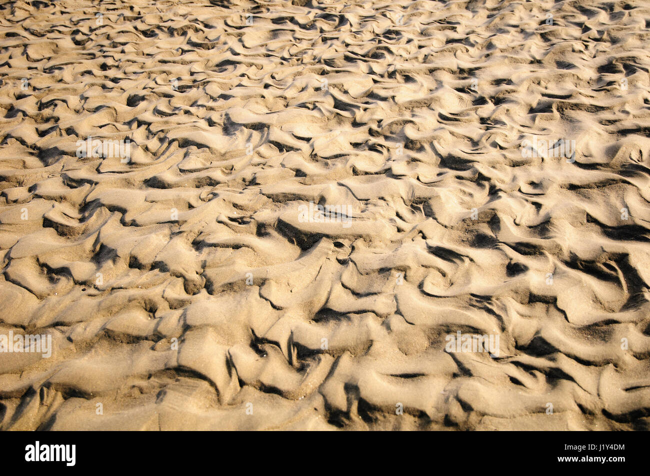 Abstract, immagini a trama di sabbia sulla spiaggia Foto Stock