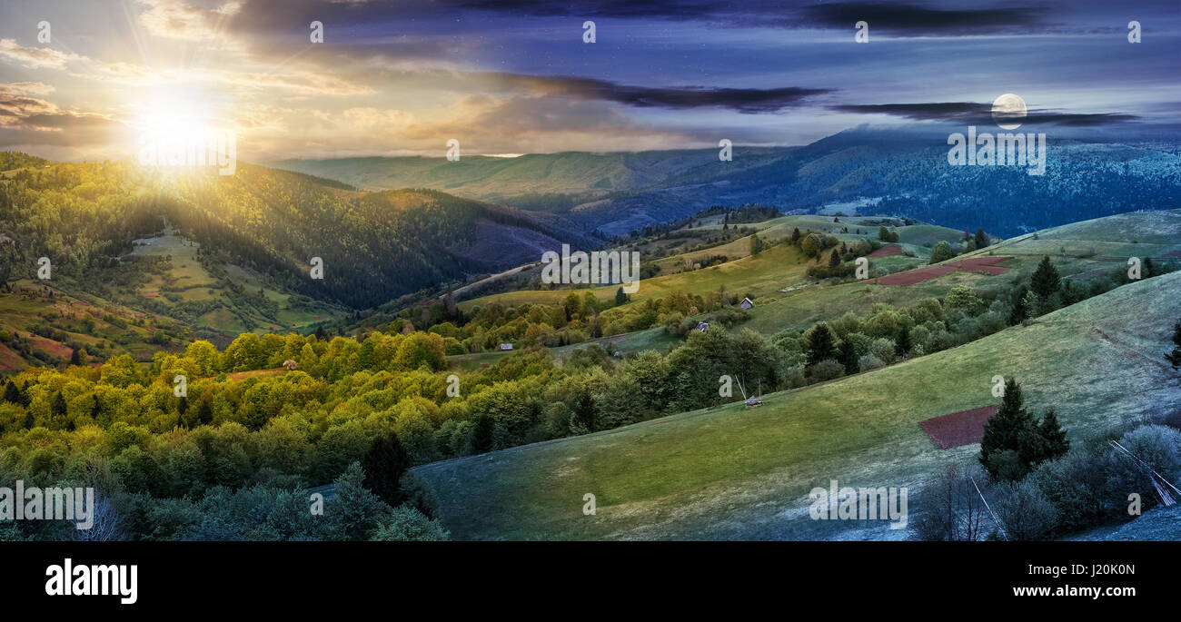 Panoramica del paesaggio rurale. Tempo cambiare idea. giorno notte nad cambiamento. bosco in montagna area rurale. verde campo agricolo sul versante di una collina. Bellissima Foto Stock