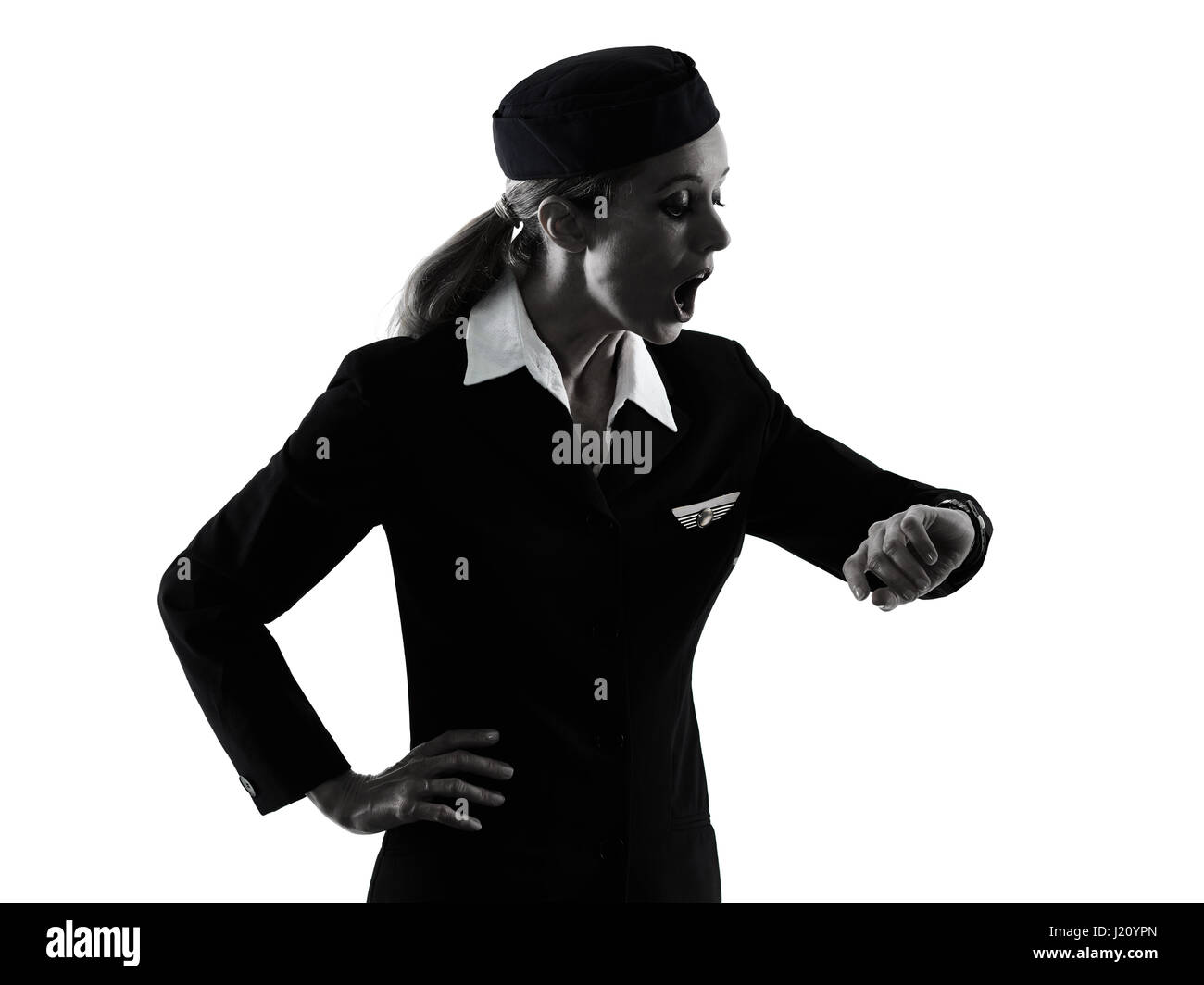 Una hostess caucasica equipaggio di cabina donna isolato su sfondo bianco in silhouette Foto Stock