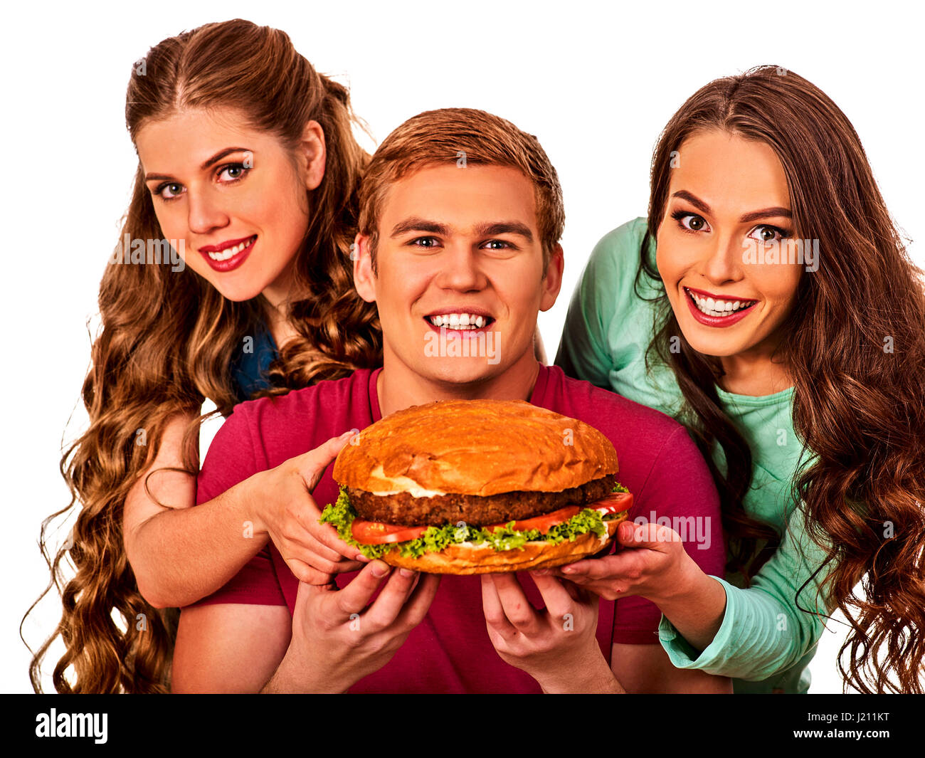 Hamburger fast food nelle persone amici mani . Foto Stock