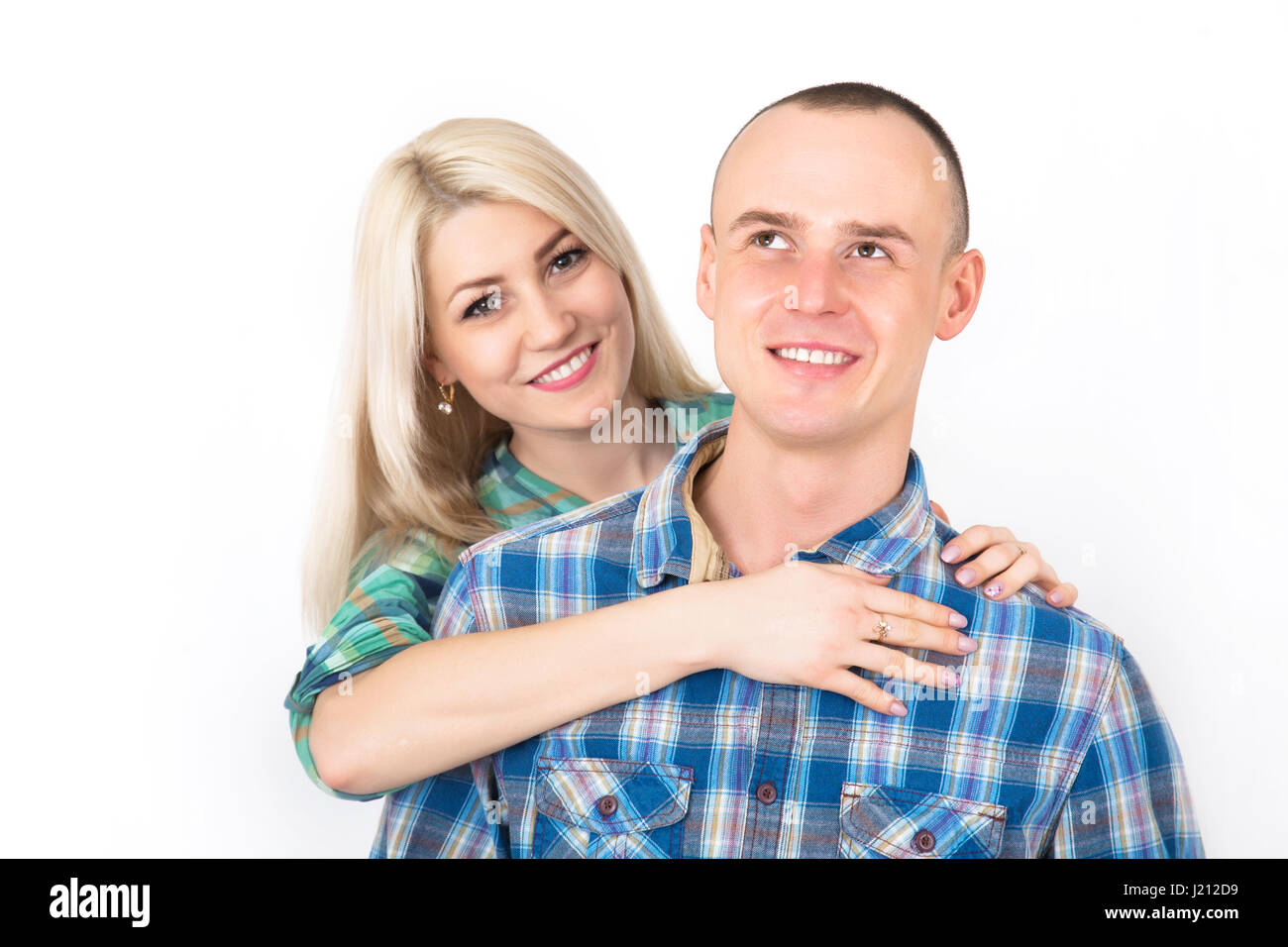 Ritratto in studio di un sorridenti giovane costeggiata su uno sfondo bianco. Foto Stock