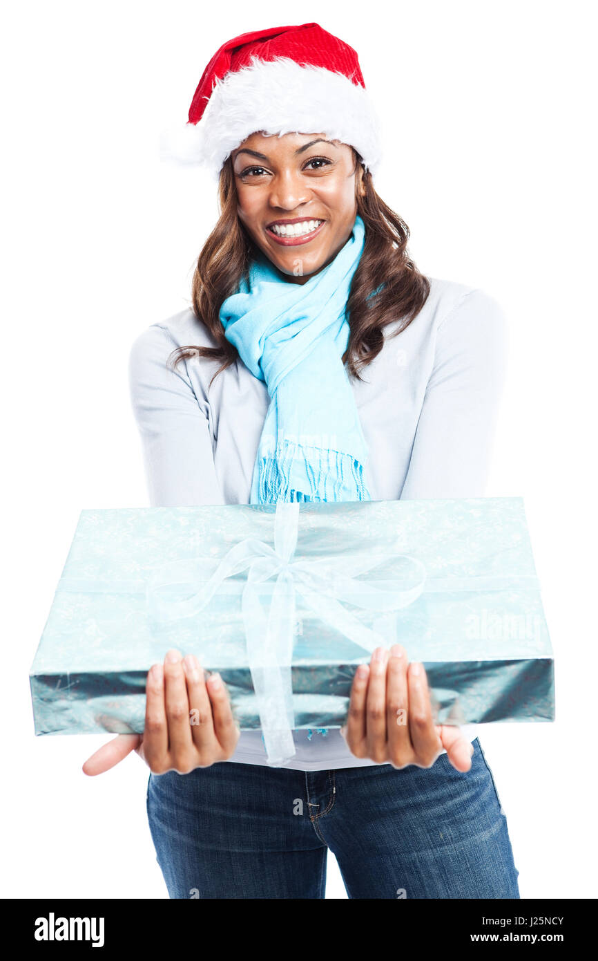 Una donna nera festeggiano il Natale di trasportare confezioni regalo Foto Stock