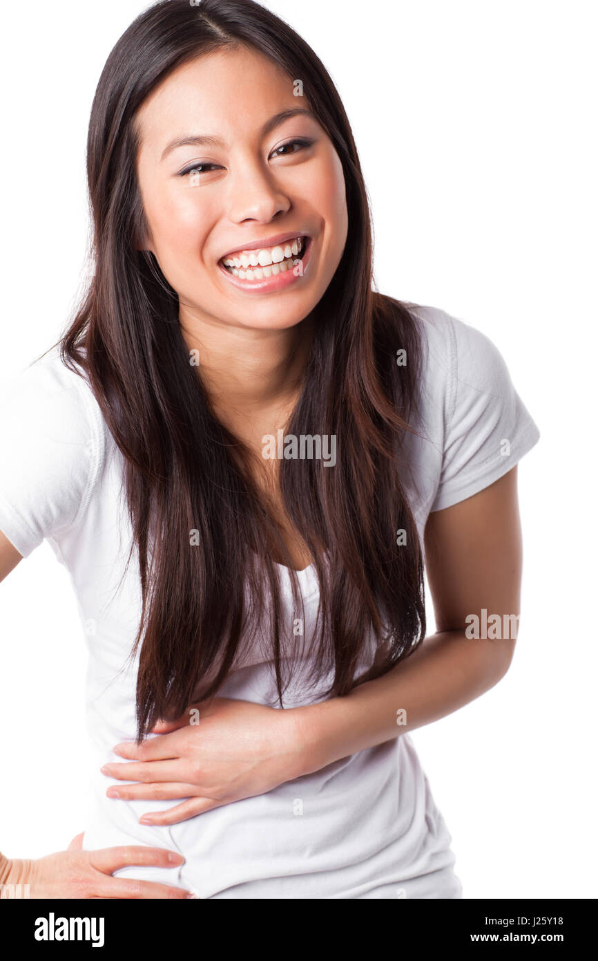 Un colpo isolato di una bella felice donna asiatica Foto Stock