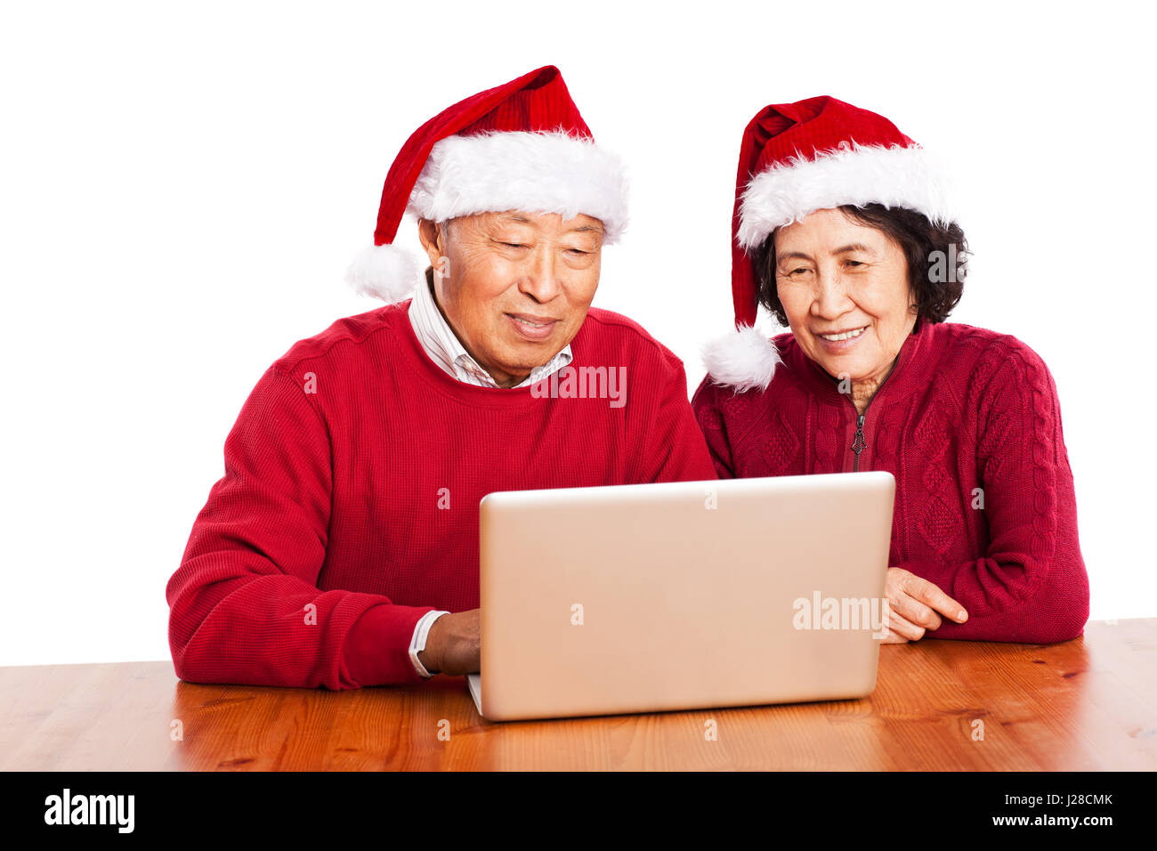 Un colpo di senior Asian nonni tramite il computer Foto Stock