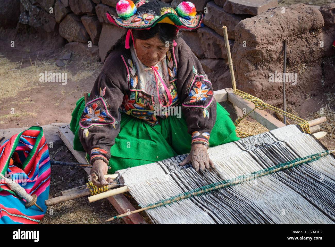 Il Perù, Puno, mestieri tradizionali (tessitura) Foto Stock