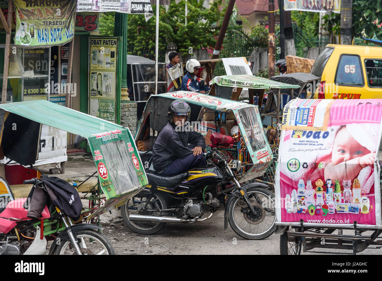 Indonesia, Sumatera Utara, Kabul Langkat, scene di strada Foto Stock