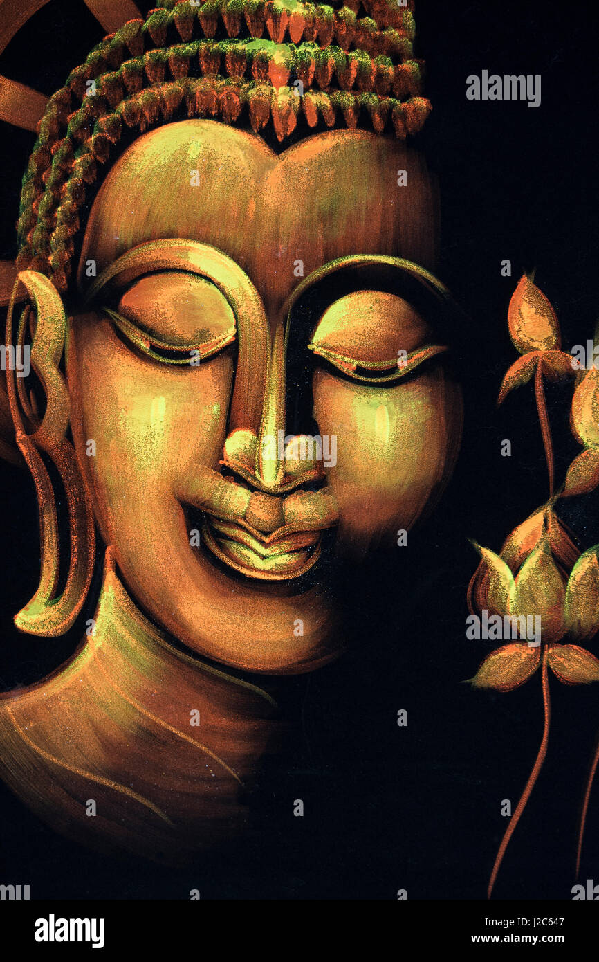 Thailandia Koh Samui, isola di Ko Samui. artigianato tradizionale, dipinto a mano il buddha faccia sul velluto nero. Foto Stock