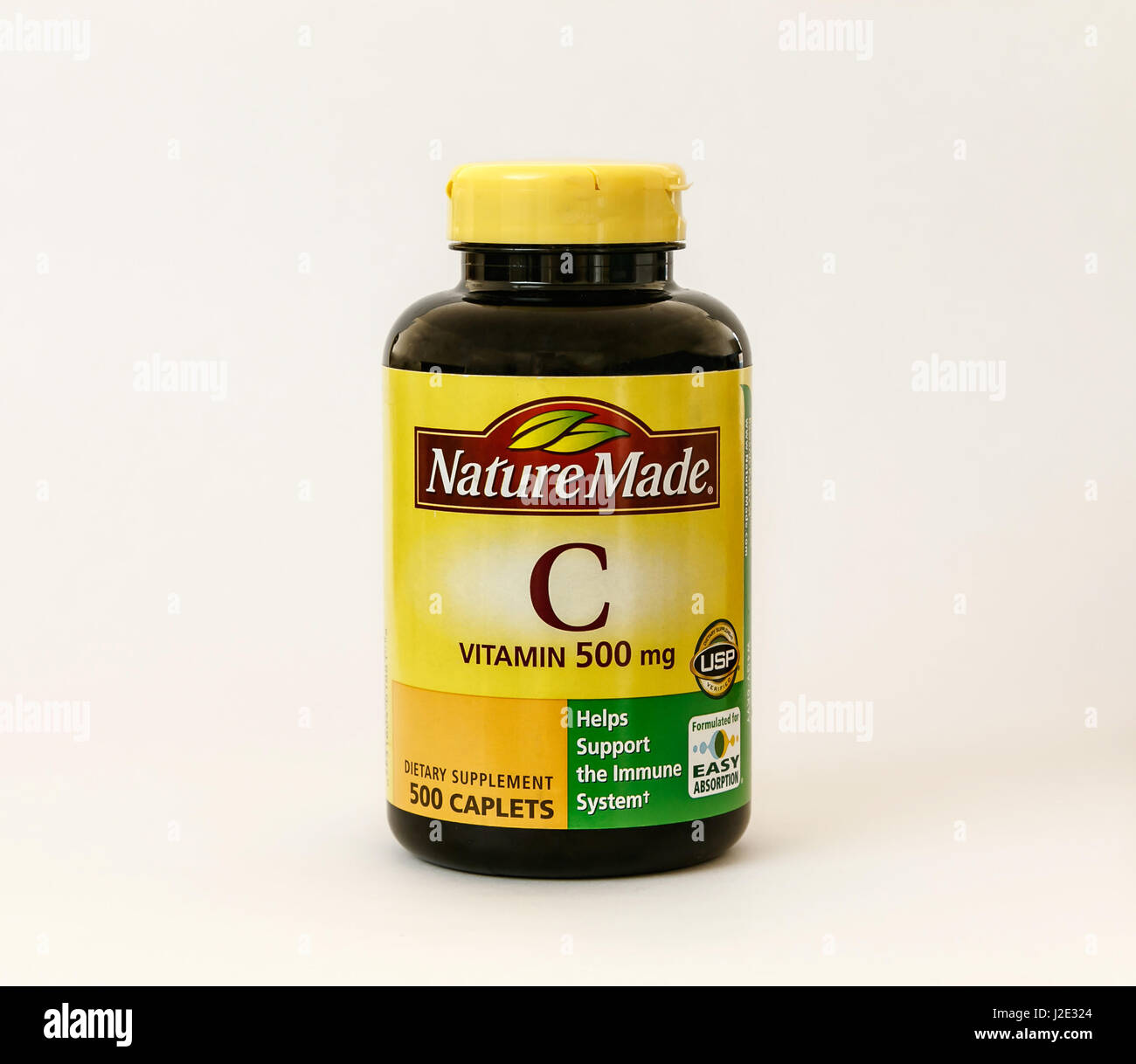 Bottiglia di 500 mg di vitamina C caplet isolato su bianco. Foto Stock