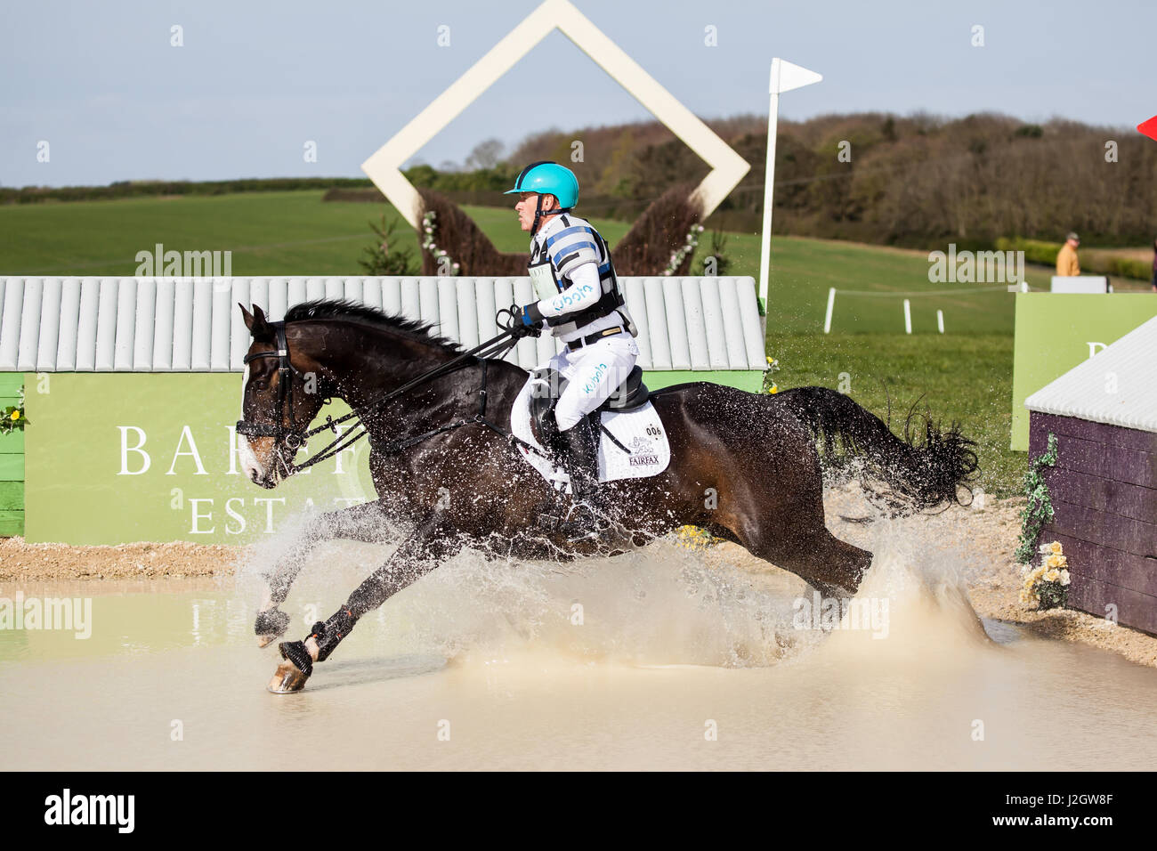 BURNHAM Market, Norfolk/Inghilterra - 15 Aprile 2017: Burnham Market International Horse Trials 2017 Andrew Hoy cross country evento Foto Stock