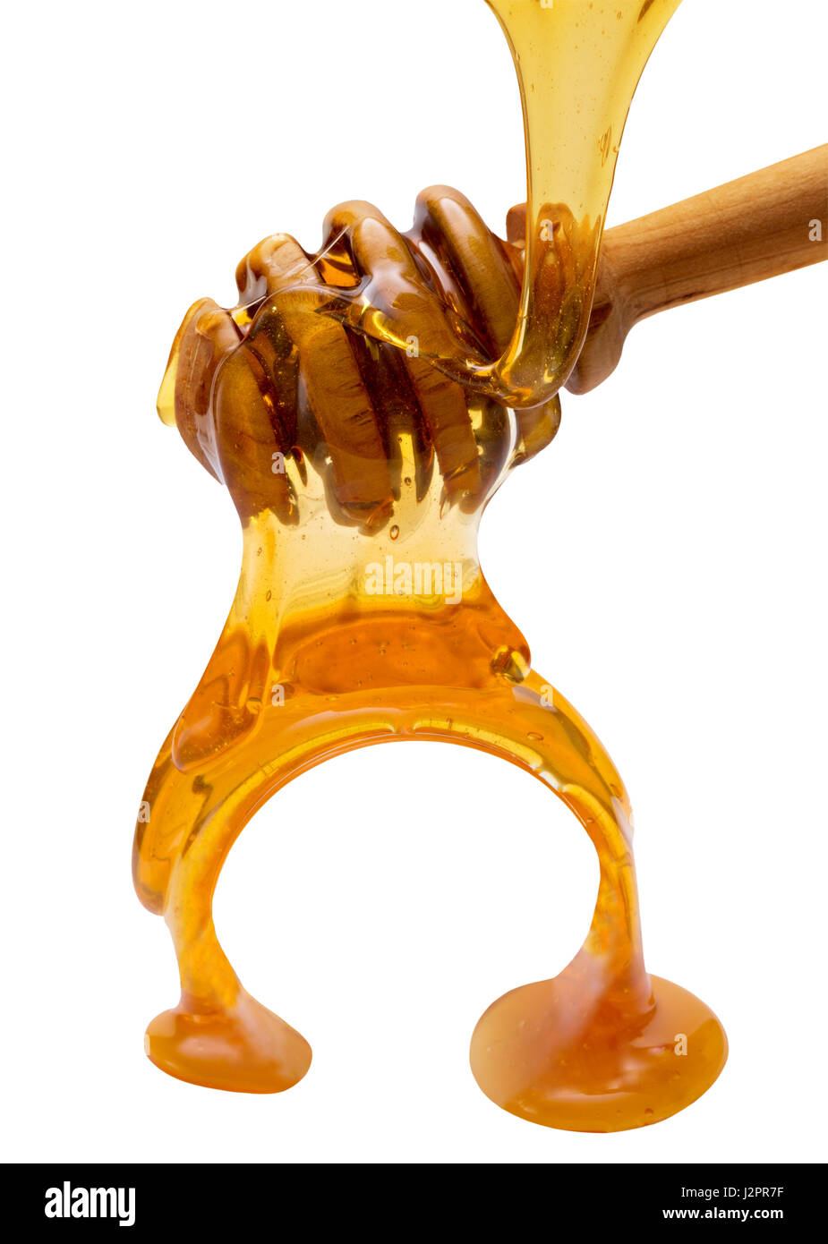 Miele di gocciolamento da stick isolato su uno sfondo bianco. Foto Stock