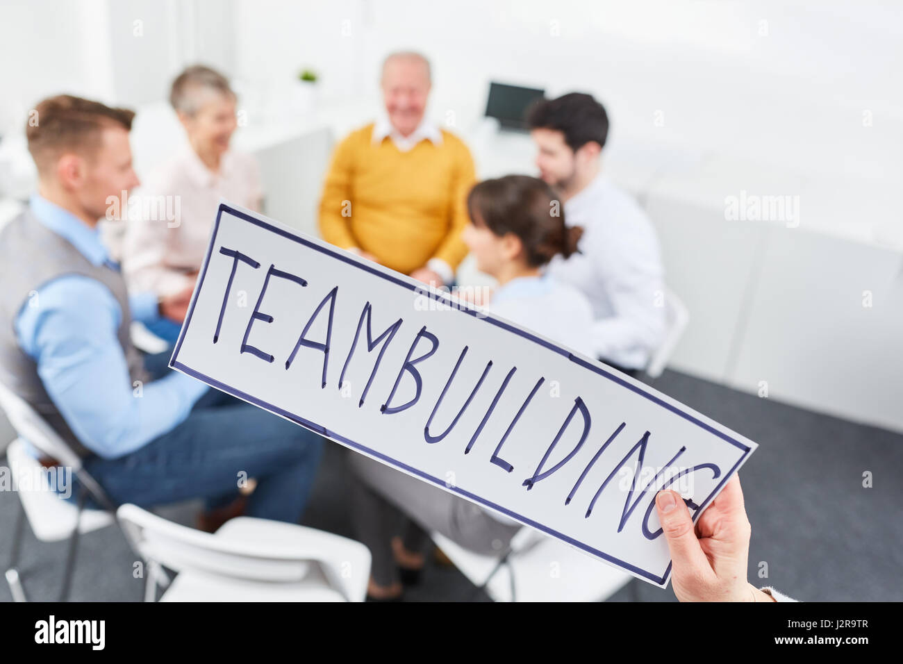 Team building il concetto di incontro per la formazione aziendale motivazione Foto Stock