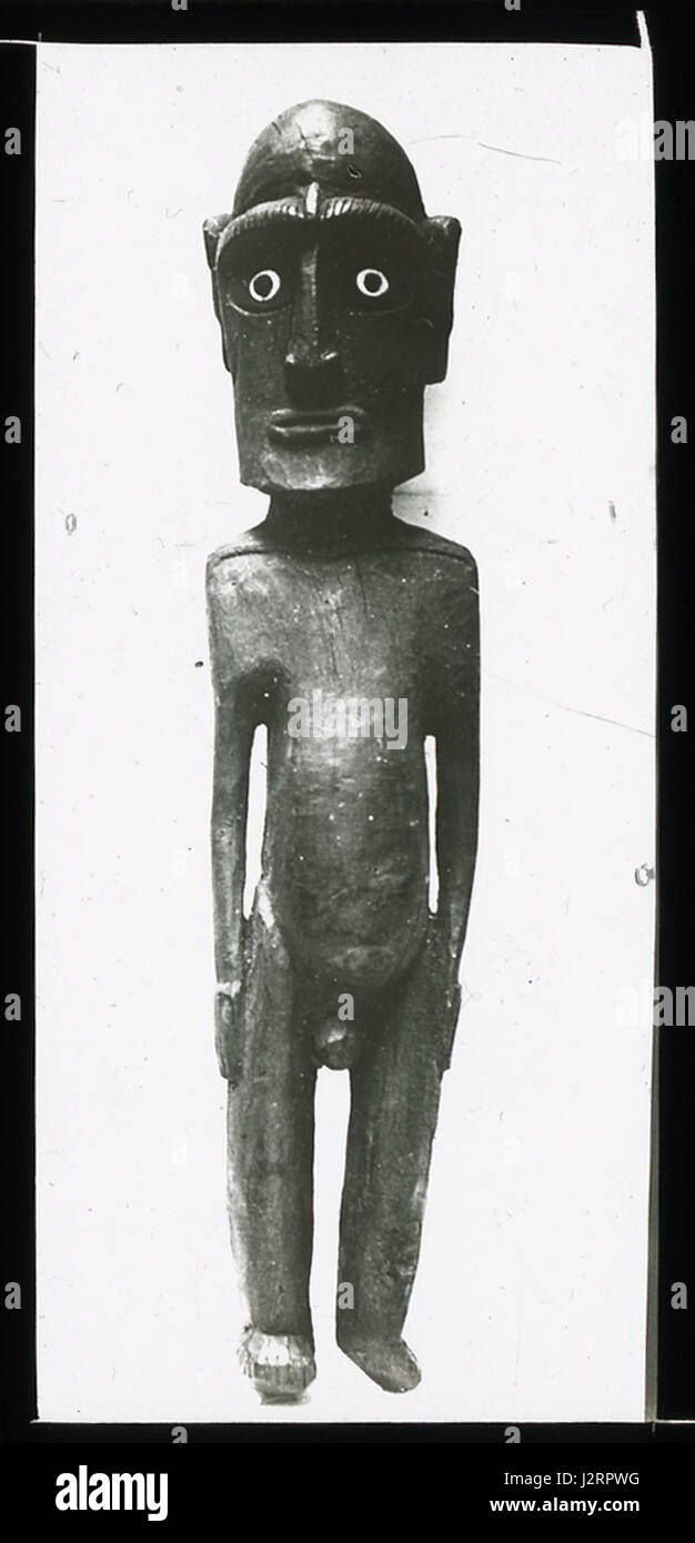 Un di legno moai kavakava figura antropomorfa carving con gli occhi di ossidiana impostato in pesci prese di vertebra. Oc,G.T.1732, Mana spedizione in Isola di Pasqua, British Museum Foto Stock