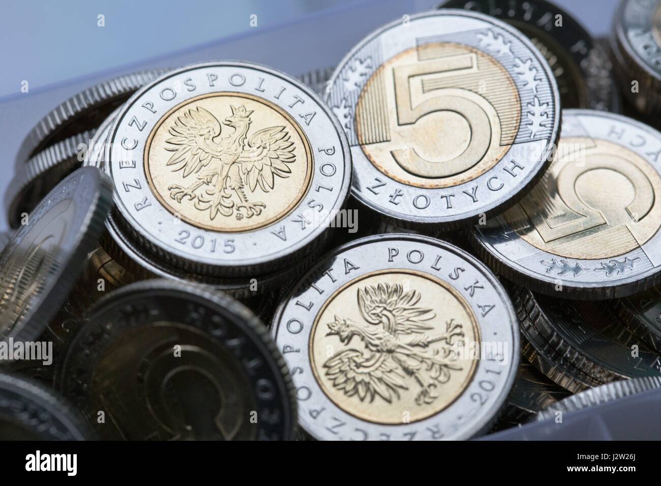 Una composizione di lucidatura delle monete in valuta Foto Stock