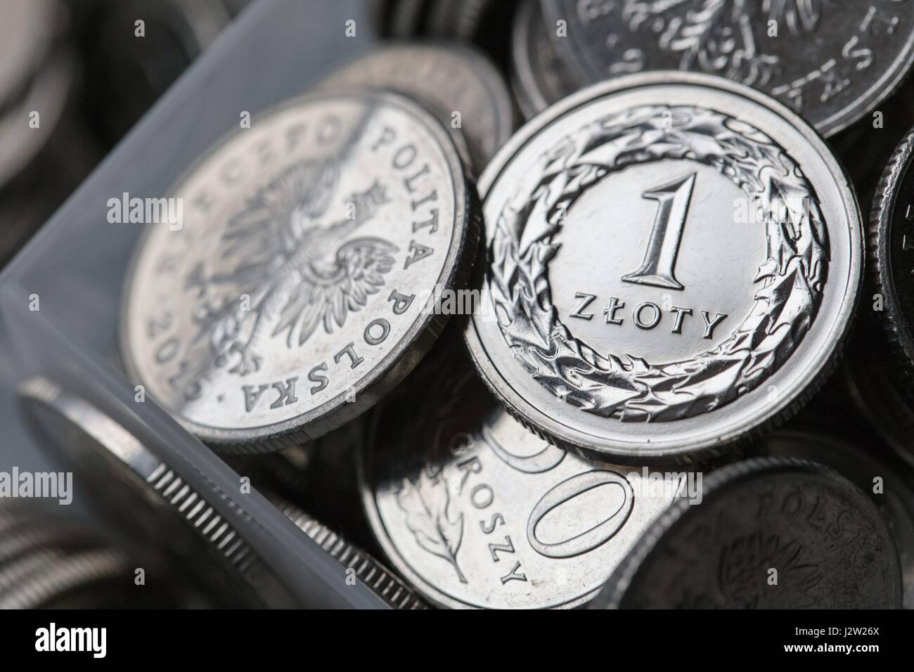 Una composizione di lucidatura delle monete in valuta Foto Stock