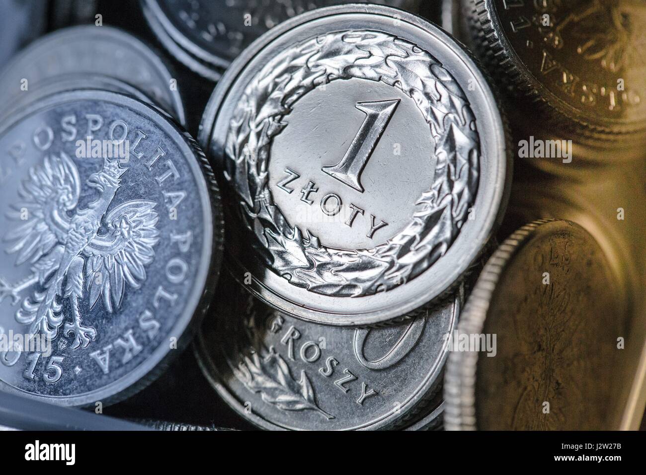 Una composizione di lucidatura delle monete in valuta Foto Stock