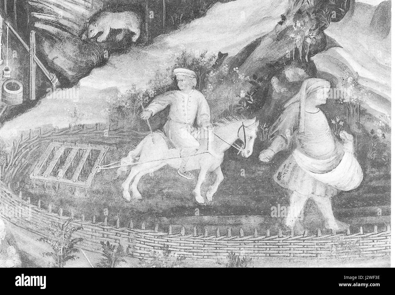 Feldarbeit, o lavoro sul campo, è un termine che si riferisce alla ricerca o ai compiti condotti direttamente in un ambiente naturale, spesso in agricoltura, antropologia o archeologia. Implica la raccolta e l'osservazione dei dati in contesti reali. Foto Stock