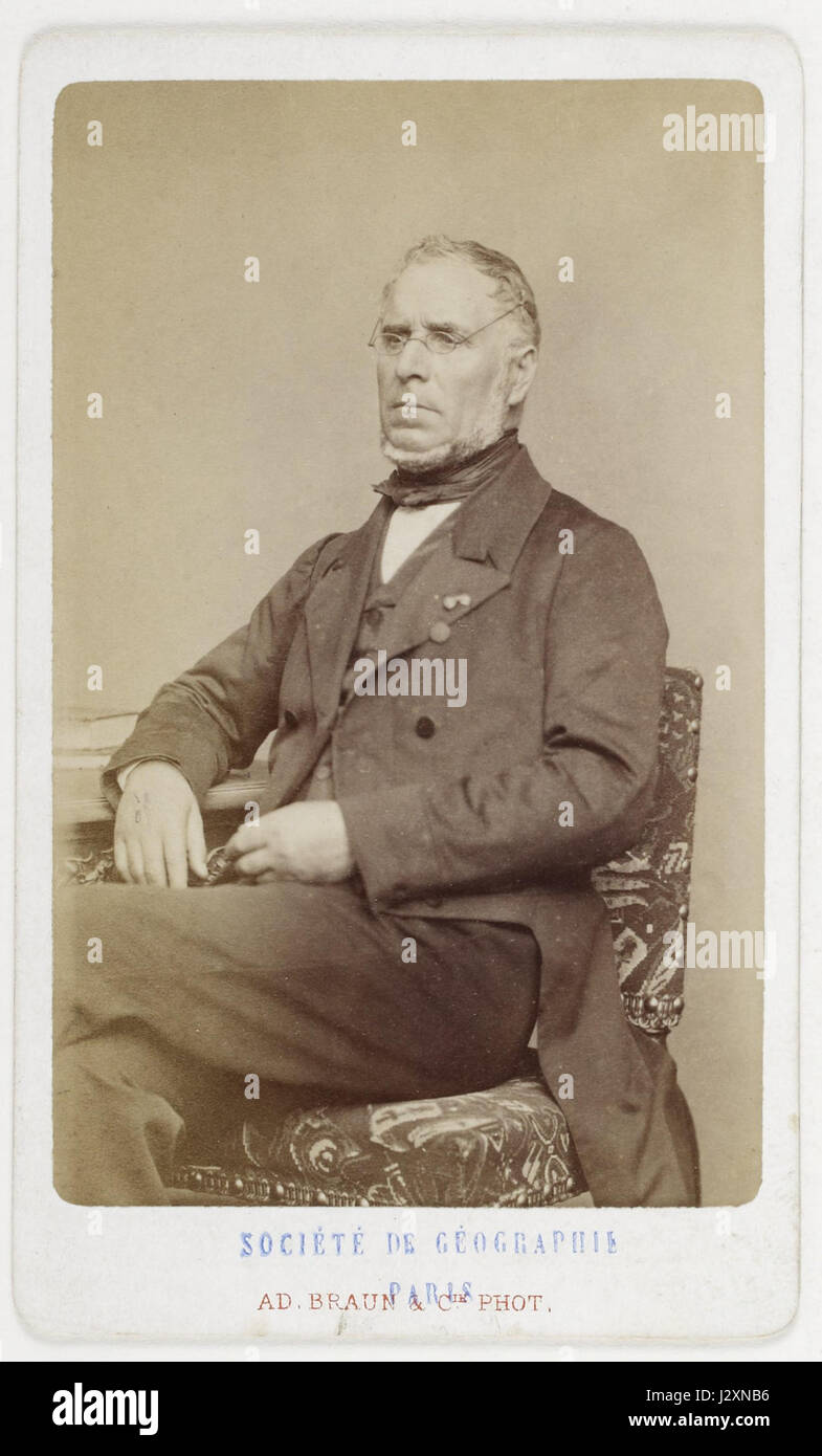 Questa fotografia CDV (cartes de visite), scattata da Adolphe Braun nel 1877, presenta Alexis Perrey, che offre uno sguardo sugli stili di moda e ritratti della fine del XIX secolo. Foto Stock