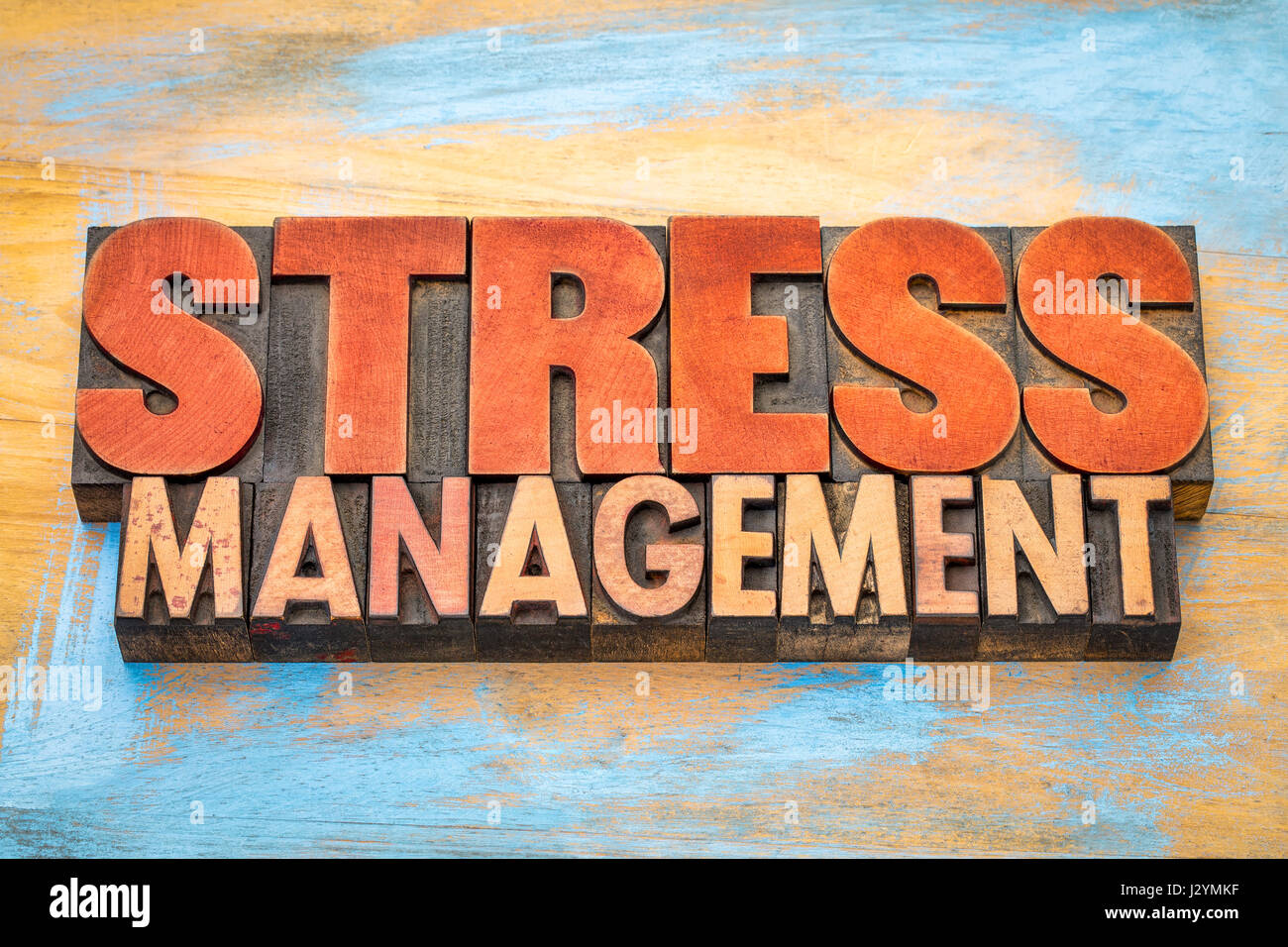 Gestione dello stress parola abstract in rilievografia tipo legno blocchi di stampa Foto Stock